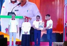 Bupati Butur Terima Penganugrahan Duta Inklusi dan Literasi Keuangan dari OJK